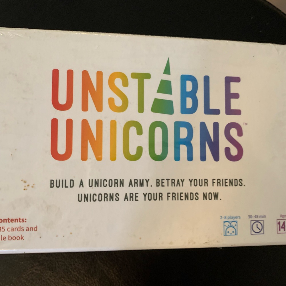 Brand new in sealed shrink wrap box unstable unicorns card game